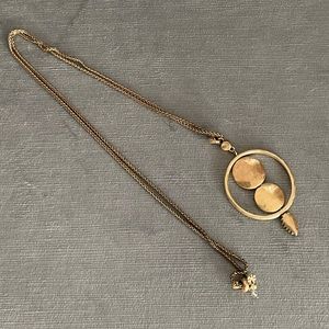 Beautiful vintage brass look necklace. Hoop with two hammered circles adj. chain